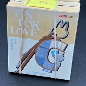 The monsters labubu Pin or Love letters h and I